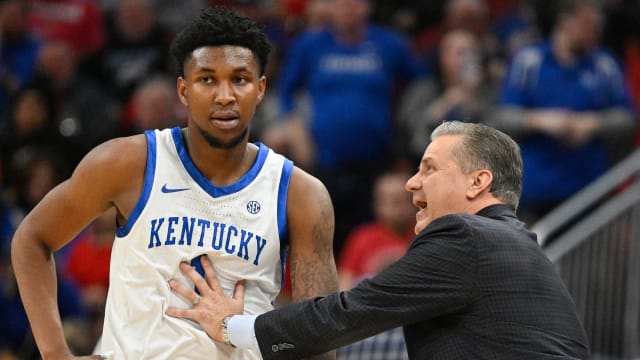 Dec 21, 2023; Louisville, Kentucky, USA; Kentucky Wildcats head coach John Calipari talks with guard Justin Edwards (1) during the first half against the Louisville Cardinals at KFC Yum! Center. Kentucky defeated Louisville 95-76. Mandatory Credit: Jamie Rhodes-USA TODAY Sports